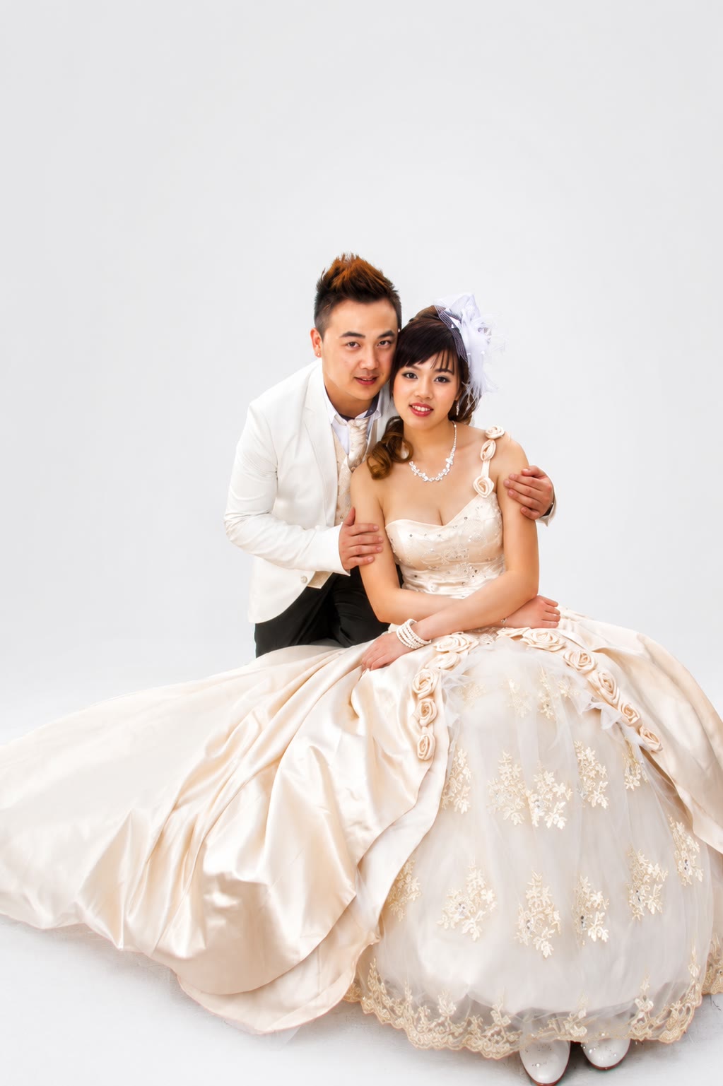 Studio portrait of Kenzo and May