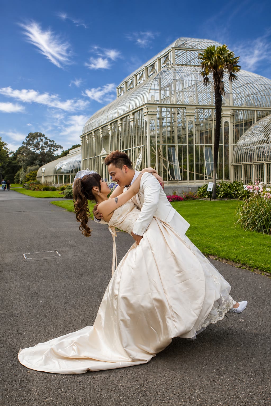 Kenzo dipping May outside the Botanic Gardens glasshouse